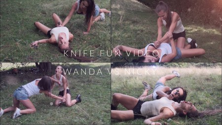 Knife fun video Wanda vs Nicky - Wanda is fighting Nicky with prop knives in multiples scenarios.

elements: stab, stabbing, stabbed, belly stab, chest stab, breast stab, heart stab, knives fight, female vs female